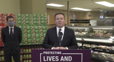 Kenney chooses cake department to announce pandemic 'bonus' for front-line workers