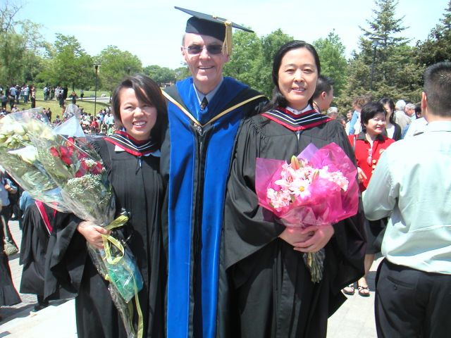 Zhengzheng and Haiyan get their Master's degrees.
